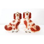 A pair of Staffordshire Spaniel ornaments,