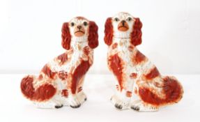 A pair of Staffordshire Spaniel ornaments,