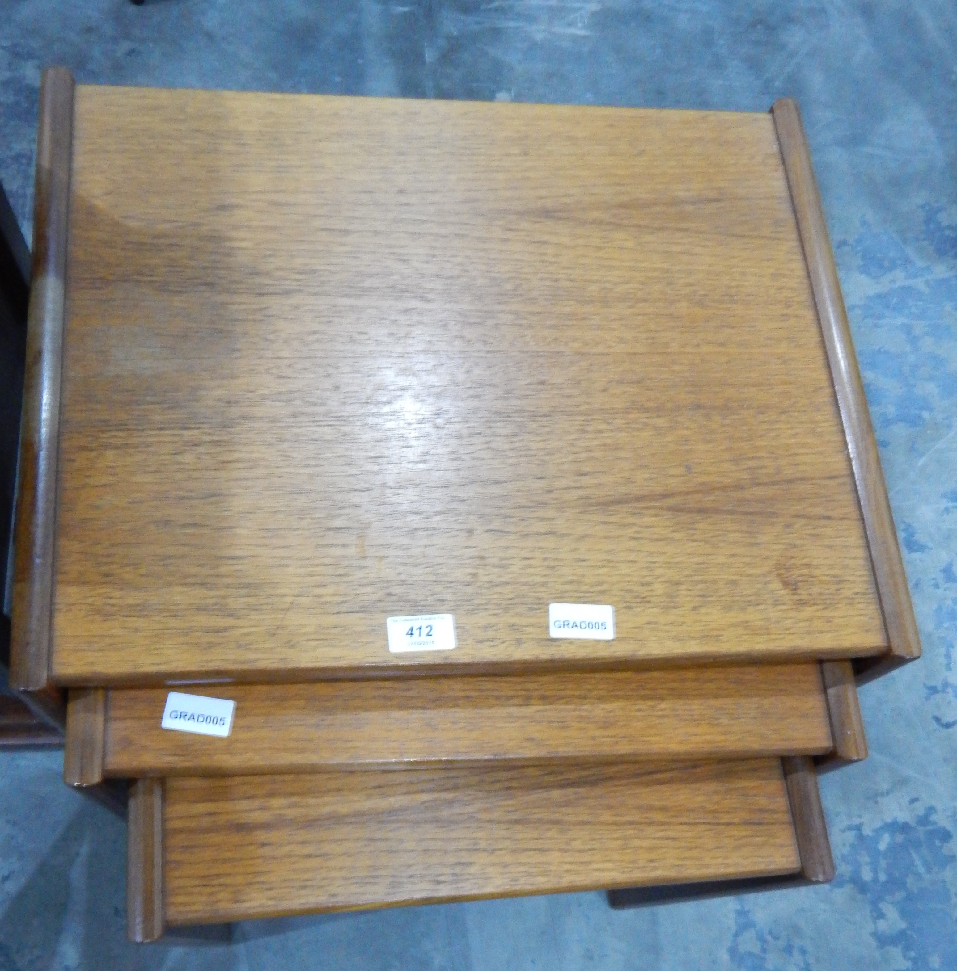 A nest of three teak finish tables - Image 2 of 2