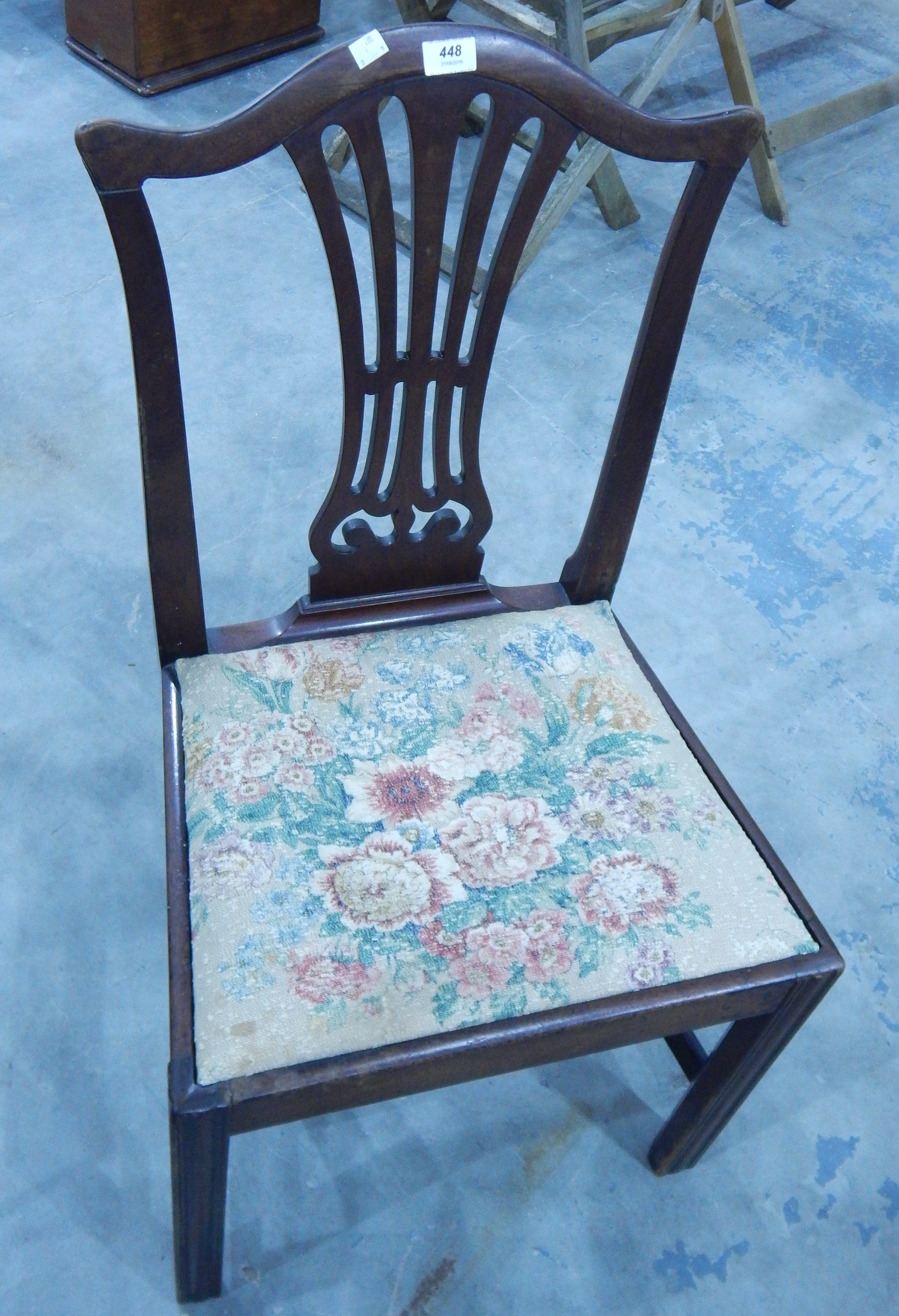 A Georgian mahogany standard chair with drop in seat,