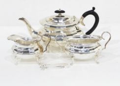 A silver plated three-piece teaset of angular baluster form together with a pair of claw handled