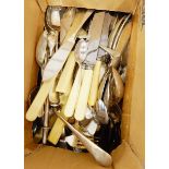 A quantity of silver plated table flatware to include fish knives and forks, etc.