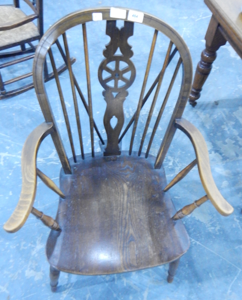 A modern wheelback Windsor style elbow chair and an Edwardian beech framed bedroom chair