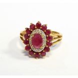 9ct gold pink and white stone cluster ring set centre faceted oval pink stone,