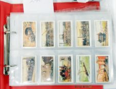 Three albums of various cigarette cards including Wills "Arms of Companies",