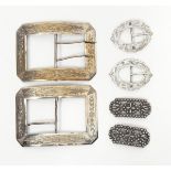 A pair of Victorian silver buckles of oval form with pierced engraved decoration,