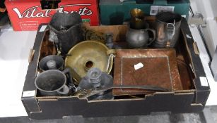 A quantity of metalware to include old pewter tankards, hammered brassware dish, chamber sticks,