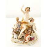 A pair of Meissen figure ornaments of a gentleman with lamb and his lady with tambourine (damaged),