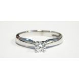 Platinum solitaire diamond ring, the stone approx. 0.