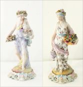 A pair of Meissen style porcelain figurines of ladies in flowing floral robes holding baskets of