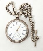 A silver open faced pocket watch with enamel dial and Roman numerals,