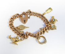 9ct gold charm bracelet with padlock clasp, approx.