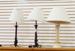 A pair of iron column table lamps and shades together with another (3)