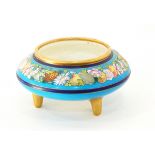 A Victorian shallow circular bowl decorated with a band of fruit and flowers on a turquoise ground,