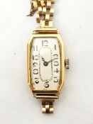 Lady's 18ct gold wristwatch with 9ct gold flexible bracelet