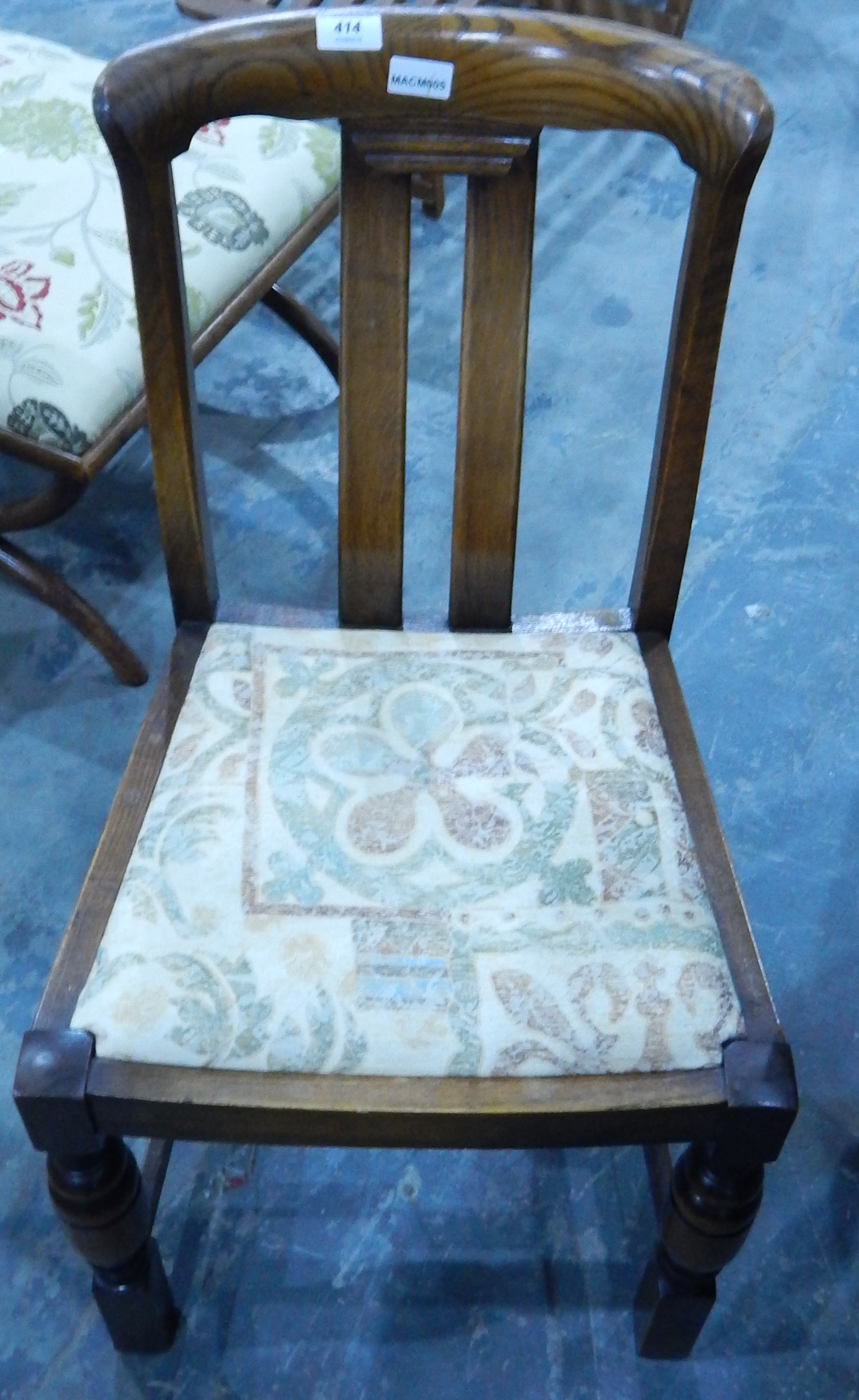 A pair of oak framed dining chairs