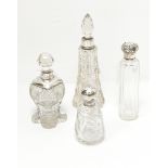 Three cut glass dressing table bottles with silver mounts and one other