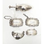 A pair of silver wine labels for brandy and port by Frances Howard,