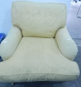 A wingside armchair with similar upholstery