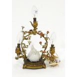 A gilt and metal table lamp,