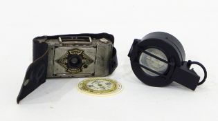 A Negretti & Zambra pocket forecaster patent number 6276/15 pocket compass together with a folding