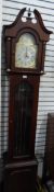 A modern mahogany finish longcase clock having eight-day Westminster chiming movement,