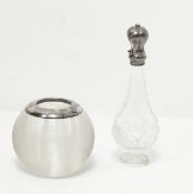 A silver mounted globular glass vesta holder and a cut glass scent bottle