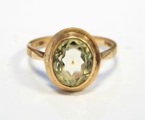 9ct gold and pale green stone solitaire ring,