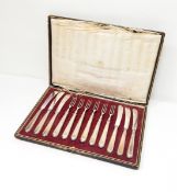 Set of six pairs silver handled tea knives and forks
