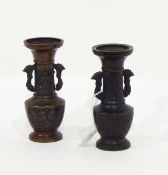A pair of Japanese bronze vases, each with everted rim, pair dragon style handles, 14.
