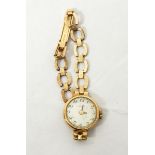 9ct gold lady's wristwatch and the 9ct gold bracelet strap