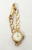 9ct gold lady's wristwatch and the 9ct gold bracelet strap