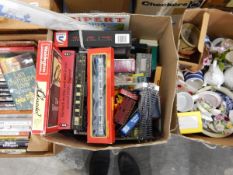 A quantity of games, Hornby 00 gauge railway carriages, etc.