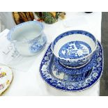 A Victorian blue and white meat plate decorated with scene of hunts before a bridge,