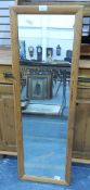 A pine framed robing mirror