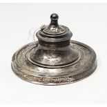 A capstan inkwell,