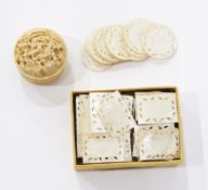 An Oriental carved mother-of-pearl game holder together with engraved mother-of-pearl counters