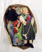 A collection of dolls in traditional Scandinavian dress
