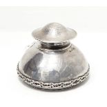 Omar Ramsden silver inkwell with flared body, raised thistle band, hinged top, London 1923,