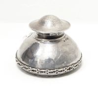 Omar Ramsden silver inkwell with flared body, raised thistle band, hinged top, London 1923,