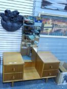 A modern teak/oak mirror back dressing chest of four short drawers,