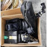 A quantity of cameras and accessories including Minolta digital SLR, tripods, etc.