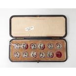 A set of 11 Edwardian silver buttons depicting figure seated, Birmingham 1901,