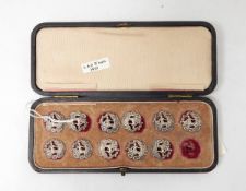 A set of 11 Edwardian silver buttons depicting figure seated, Birmingham 1901,