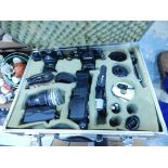 A fitted case with SLR cameras and accessories together with further cameras, lenses, etc.