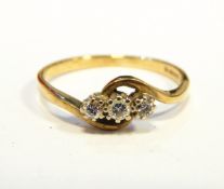 Gold three stone diamond ring