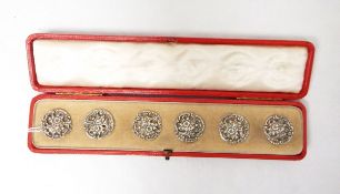 Set of six Edwardian silver floral buttons, Birmingham 1902 by Strauss & Barder,