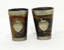 A pair of horn beakers with silver plated mounts,