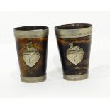 A pair of horn beakers with silver plated mounts,
