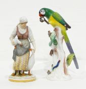 A Meissen style figure of a girl with geese, on circular base,